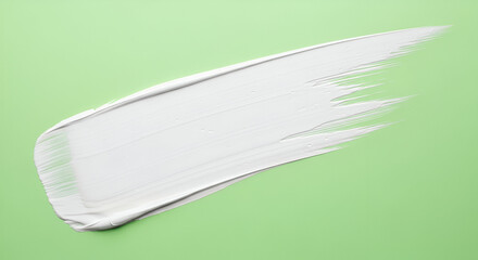 White abstract brush stroke on light green background