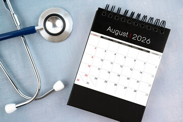 August 2026 calendar and stethoscope, Medical appointment schedule to check up concept.