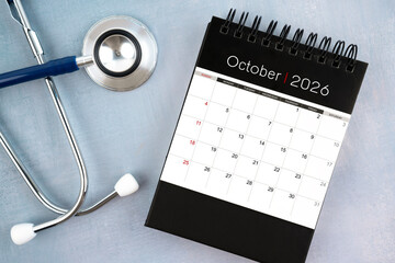October 2026 calendar and stethoscope, Medical appointment schedule to check up concept.