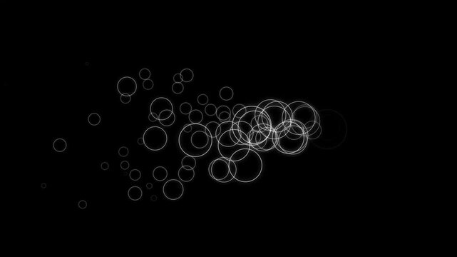 Circle blast, babol blast glitter dust sparkle trail overlay on a black screen background. shining magical particles, fairy pixie dust path perfect for festive holiday animations. 4k