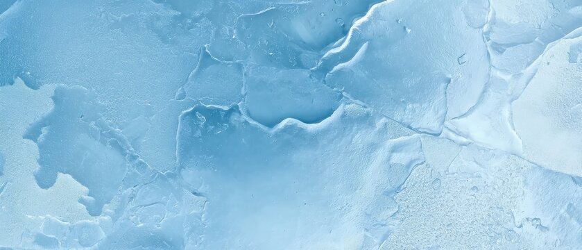 Ice block texture with frosty surface on blue background, cold and wintery. Suitable for backgrounds, prints, and seasonal content.