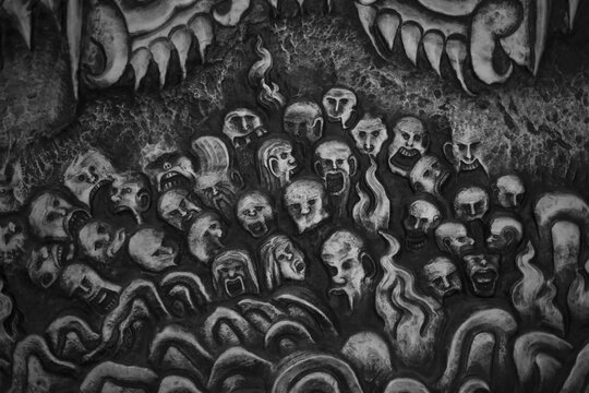 Tormented faces dominate horror art macabre illustration, gothic style. dark fantasy surreal image conveys intense despair emotion. Monochrome drawing shows unsettling figures an eerie background