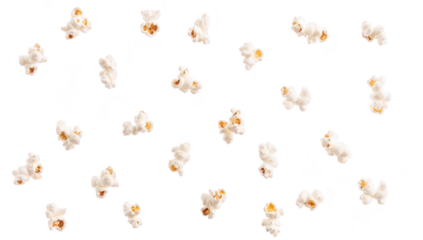 A scattered arrangement of fluffy popcorn kernels on a clean white background. ideal for food-related themes. snack advertisements. or culinary presentations