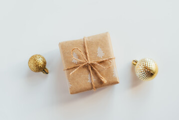 Christmas gift box and decorations on white background