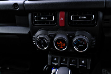 Car interior, dashboard, cockpit, driver's seat, steering wheel, speedometer, tachometer, gauge, instrument panel, climate control, AC, navigation, dashboard display, car door, door handle, pedal,