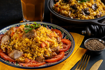 Traditional pilaf with meat, spices and drink