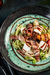 Prosciutto salad with cheese and balsamic dressing