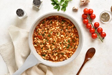 One pot meal with ground beef, pasta and vegetables simmered in tomato sauce