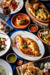 Traditional Georgian feast with khachapuri and assorted dishes