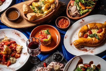 Authentic Georgian cuisine feast with khachapuri and wine
