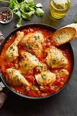 Georgian chicken stew with tomatoes and herbs