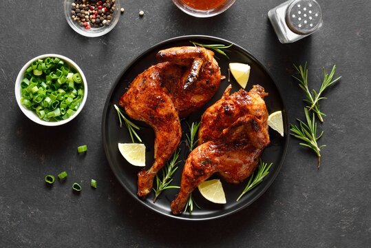 Grilled half chicken with lemon and rosemary