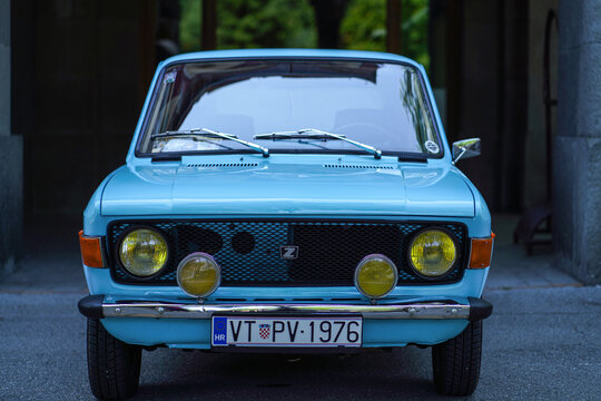 Front view close-up of a perfectly maintained blue classic Zastava 101 (related Fiat 128, Skala, Yugo, Stojadin) - Yugoslavian automotive history. 08 June 2025, Subotica, Serbia