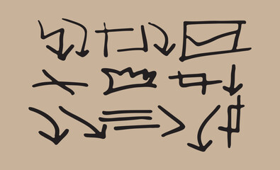 Collection of hand drawn sketch arrows and symbols on a textured background
