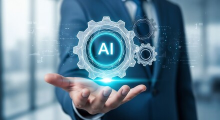 A businessman in a suit holds his hand open, with a large, glowing blue holographic interface floating above it. The interface shows interconnected gears with the letters "AI" in the center, symbolizi