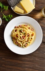 Carbonara pasta, spaghetti with crisp pancetta and black pepper