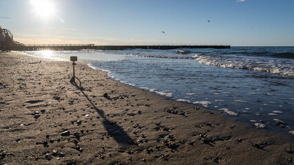 sandy beach on the embankment of Zelenogradsk