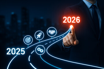 A businessman pointing to the year 2026 at the end of a glowing road with icons for target, rocket, handshake, and gears, representing a future business roadmap and strategy
