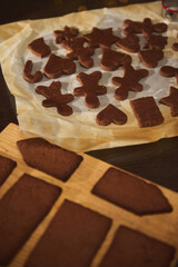 Gingerbread Shapes On Baking Tray For Christmas Treats At Home