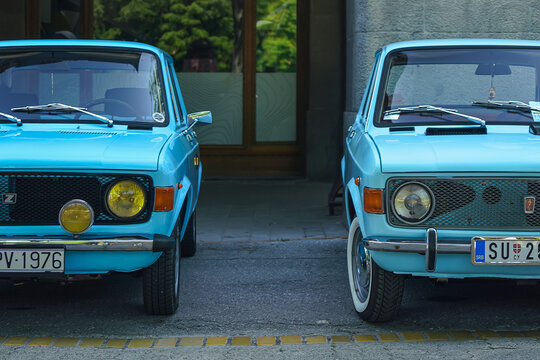 Two light blue classic Zastava 101 (FIAT 128, Stojadin, Skala, Yugo) cars parked side-by-side. Yugoslavian automotive history, nostalgia and timeless retro design. 08 June 2025 Subotica, Serbia