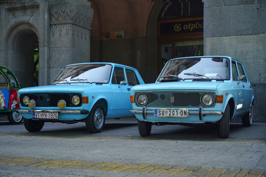 Two light blue classic Zastava 101 (FIAT 128, Stojadin, Skala, Yugo) cars parked side-by-side. Yugoslavian automotive history, nostalgia and timeless retro design. 08 June 2025 Subotica, Serbia