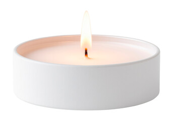 Burning tea candle in round holder isolated on transparent background