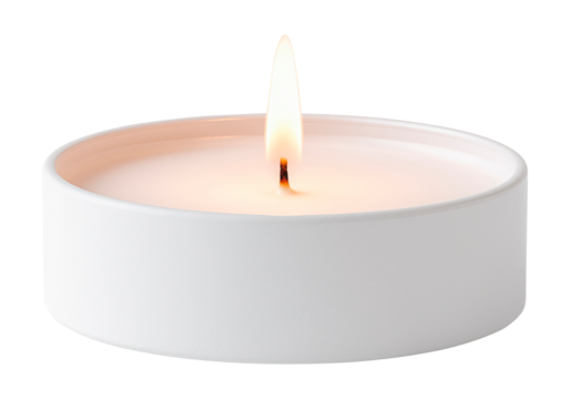 Burning tea candle in round holder isolated on transparent background
