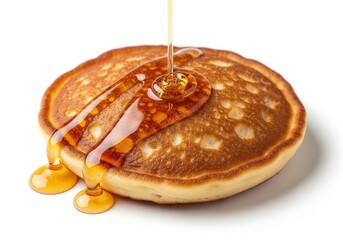 A perfectly cooked golden-brown pancake being generously drizzled with rich, amber syrup. Isolated white background.