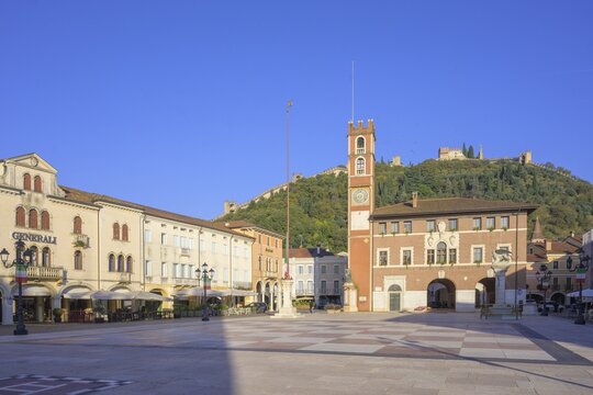 Piazza Castello with chessboard pattern, the town hall and Castello Superiore in the background, Marostica, province of Vicenza, Italy