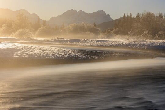 Wild river, riverbed, winter, snow, hoarfrost, backlight, fog, long exposure, Isar, view of Zugspitze, Wetterstein range, Bavaria, Germany