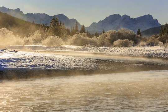 Wild river, riverbed, winter, snow, hoarfrost, backlight, fog, Isar, view of Zugspitze, Wetterstein mountains, Bavaria, Germany