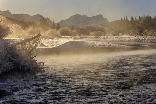 Wild river, riverbed, winter, snow, hoarfrost, backlight, fog, Isar, view of Zugspitze, Wetterstein mountains, Bavaria, Germany