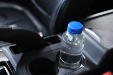 The water bottle in the car