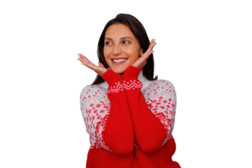 Woman smiling, feeling joy and surprise, celebrating holidays in a festive winter sweater with transparent background