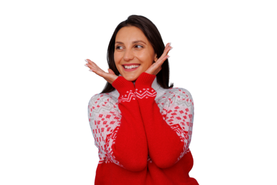 Woman smiling, feeling joy and surprise, celebrating holidays in a festive winter sweater with transparent background
