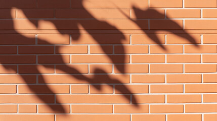 Light and Shadow, Shadowy tree branches dance on an old brick wall, captured in a serene, artistic image.