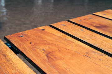 Natural wooden surface, smooth light brown planks with detailed grain patterns, ideal for design projects or rustic decor.