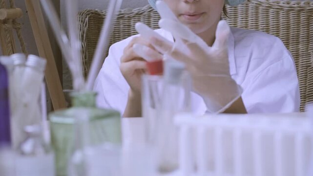 Young students put on protective gloves before hands-on chemistry experiment, curiosity and learning practical laboratory work, Science education, scientific discovery, safety first in science class