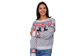 Cheerful woman smiling, wearing a holiday sweater with reindeer design. Celebrating christmas and winter season with joy and happiness