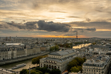 Paris, France - 09 27 2025: Saint-Jacques Tower. Panoramic view of The Seine river, bridges, Eiffel Tower, Les Invalides at sunset