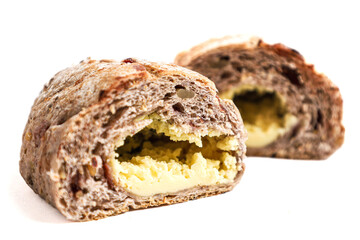 Cranberry sourdough with cheese filling isolated on white background.
