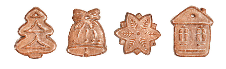 Christmas gingerbread cookies isolated on white background. Christmas cookies in the shape of a Christmas tree, house, star, bell.