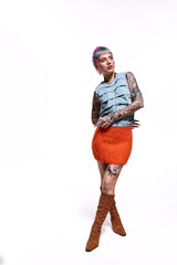 Bright and bold young woman showcases colorful style in vibrant studio setting