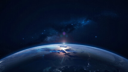 Fototapeta premium A breathtaking view of earth from space, with a stunning sunrise illuminating the horizon