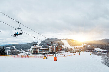 Obraz premium Chairlift at a mountain ski resort.