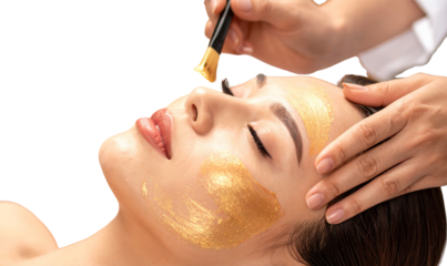 Professional Aesthetician Smiling While Applying Gold Facial Mask on Client’s Cheeks, Side Angle, Isolated on Transparent Background