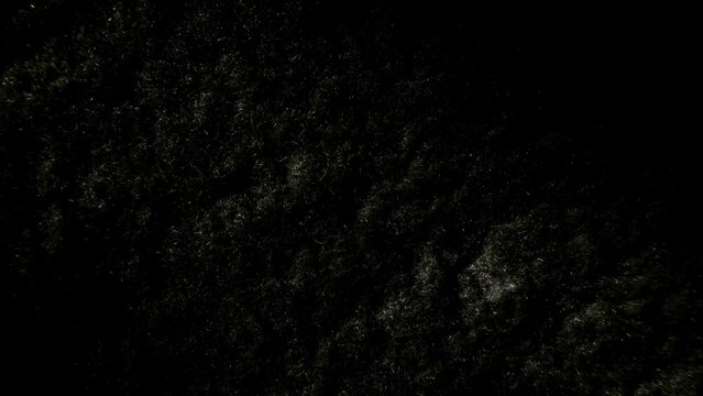 close-up textured dark surface with soft light reflections, abstract design for backgrounds or commercial use