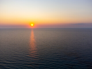Aerial view of a beautiful sunset at sea