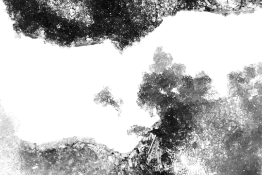 Abstract grunge black and white distressed transparent texture swirly fabric overlay background