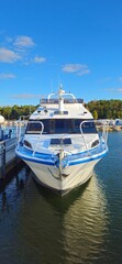 Fototapeta premium boat, sea, boats, water, fishing, harbor, port, ocean, marina, yacht, dock, ship, sky, travel, harbour, summer, beach, tourism, coast, bay, nature, pier, reflection, nautical, landscape